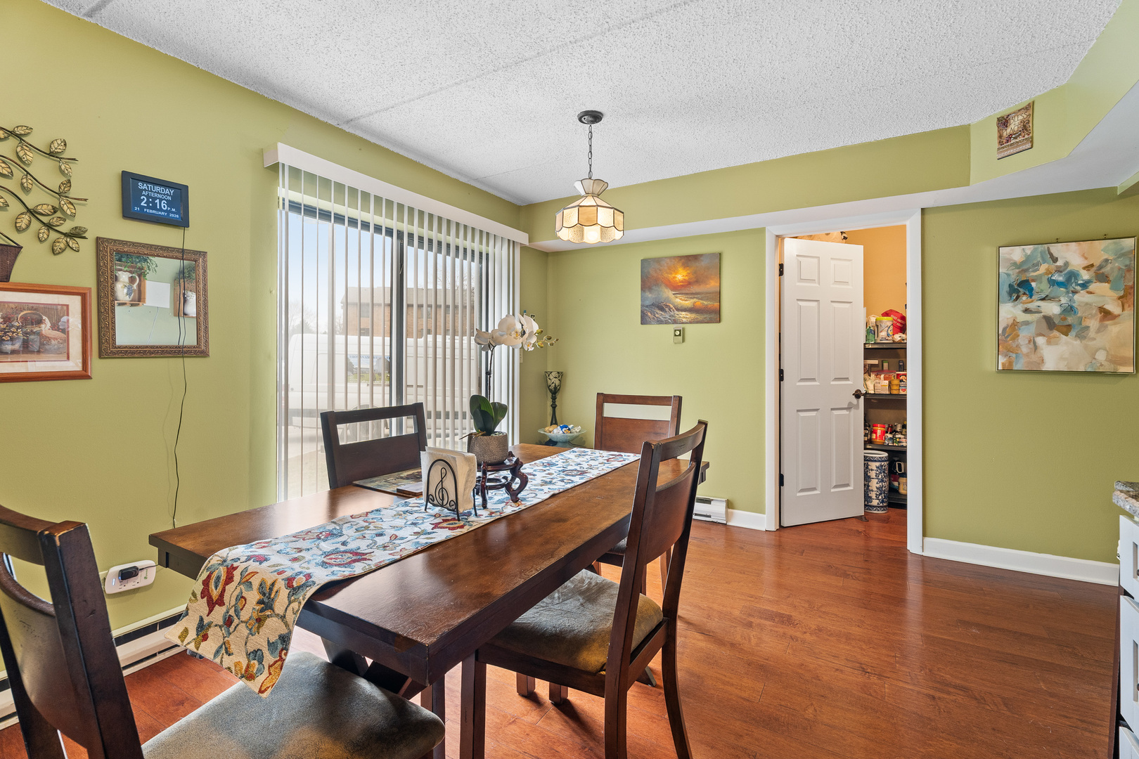 730 Briar Hill Lane, Unit 1 Addison, IL 60101 - Photo 9 of 16 a view of a dining room with furniture window and wooden floor
