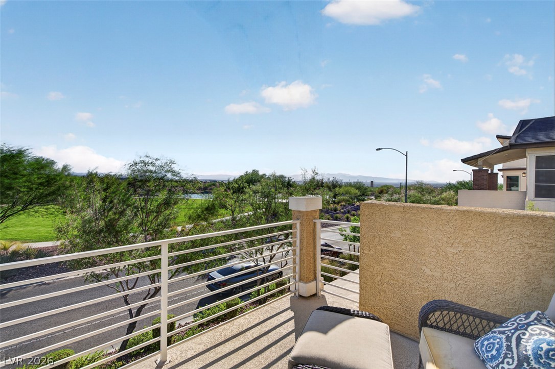 1100 East Sunset Road Henderson, NV 89011 - Photo 42 of 58 Unwind on this terrace overlooking the scenic landscape, offering serene outdoor living.