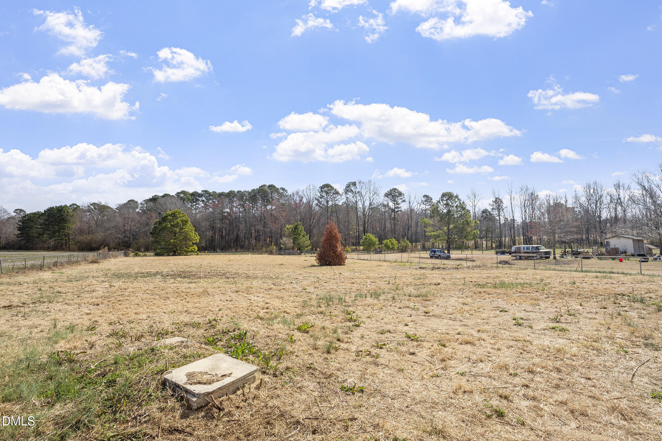 10965 Beaver Dam Road Middlesex, NC 27557 - Photo 21 of 24 a view of a lake and a yard