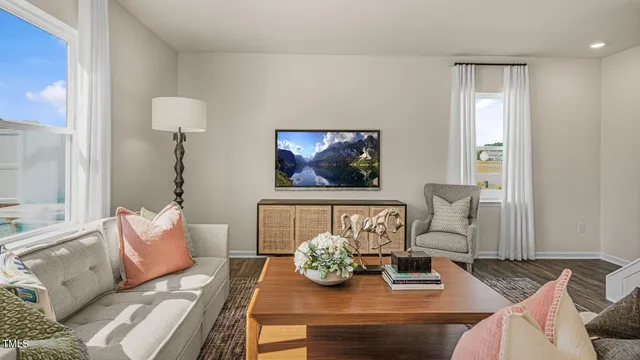 a bedroom with a bed and a wall painting