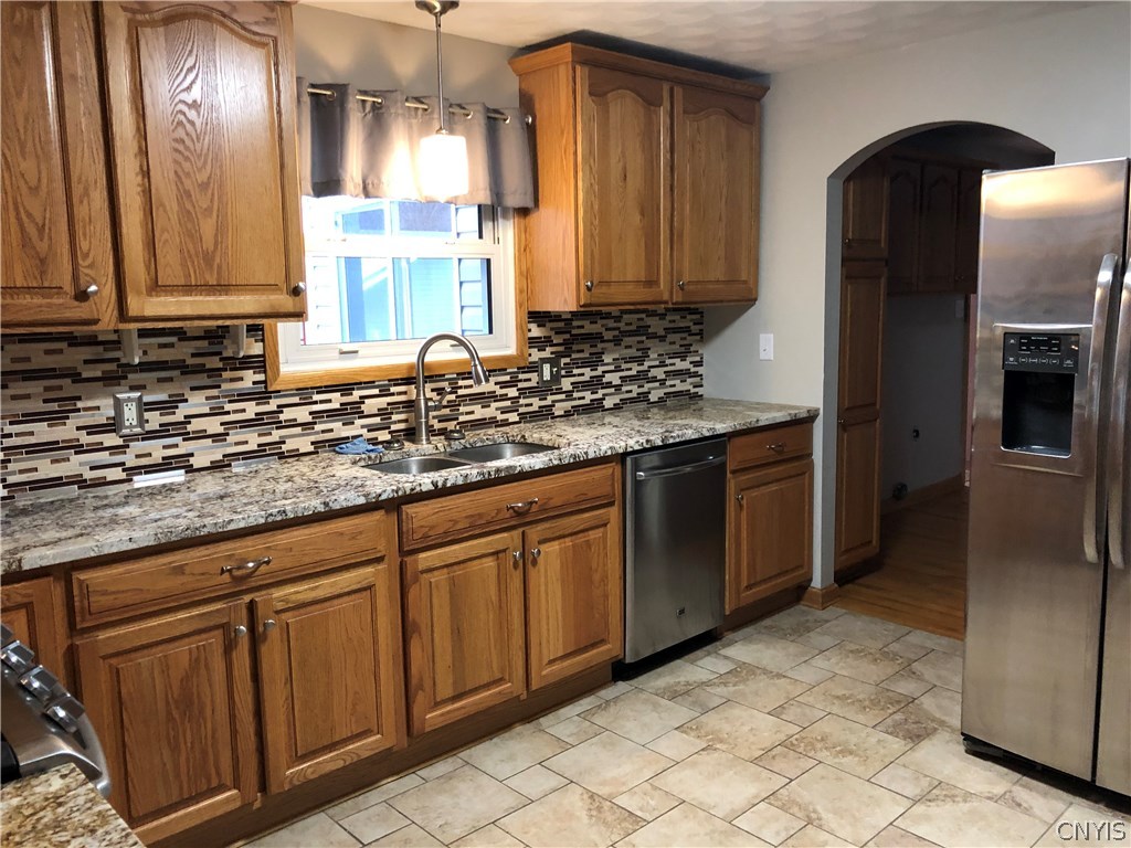9274 Capron Road Lee, NY 13363 - Photo 19 of 36 Galley kitchen with granite counters, ceramic tile