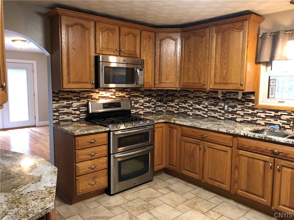 9274 Capron Road Lee, NY 13363 - Photo 20 of 36 Oak Craft Maid Cabinets in Galley kitchen with gra