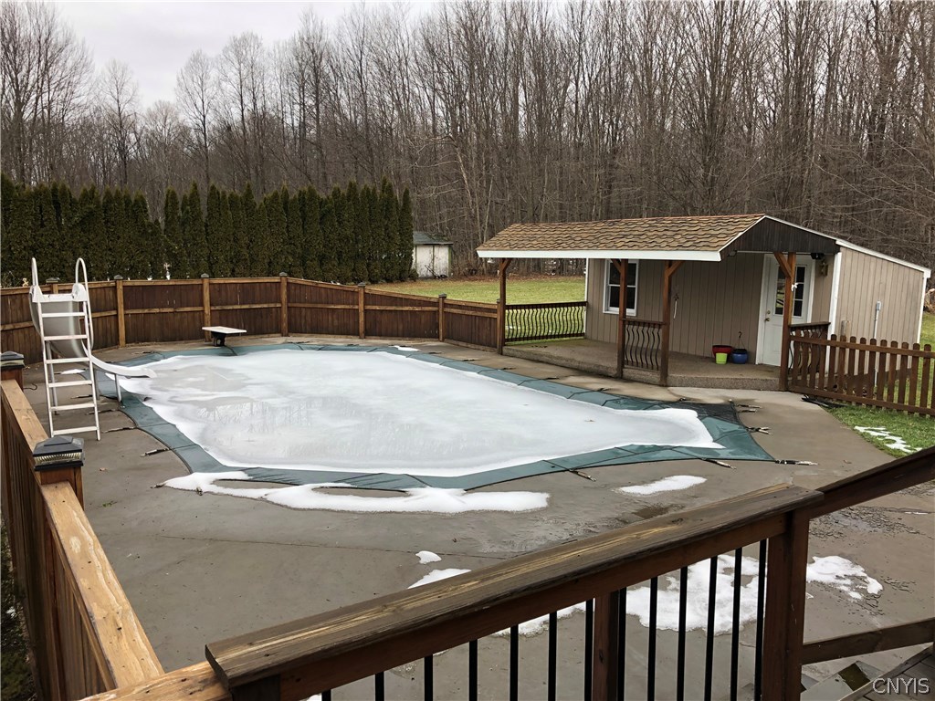 9274 Capron Road Lee, NY 13363 - Photo 9 of 36 View of fenced in patio and pool house from main d