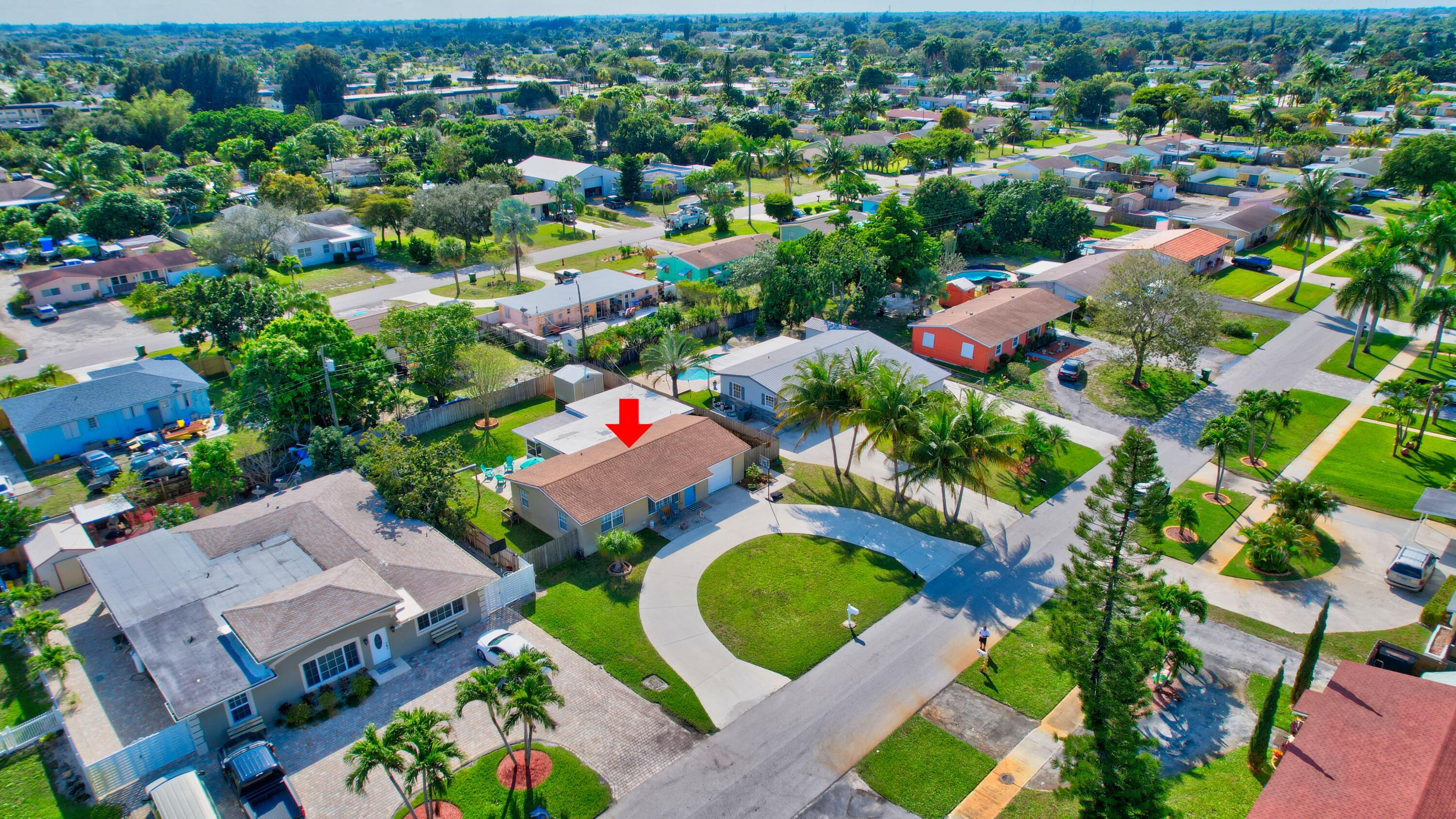 125 Riley Avenue Palm Springs, FL 33461 - Photo 23 of 24 an aerial view of residential houses with outdoor space