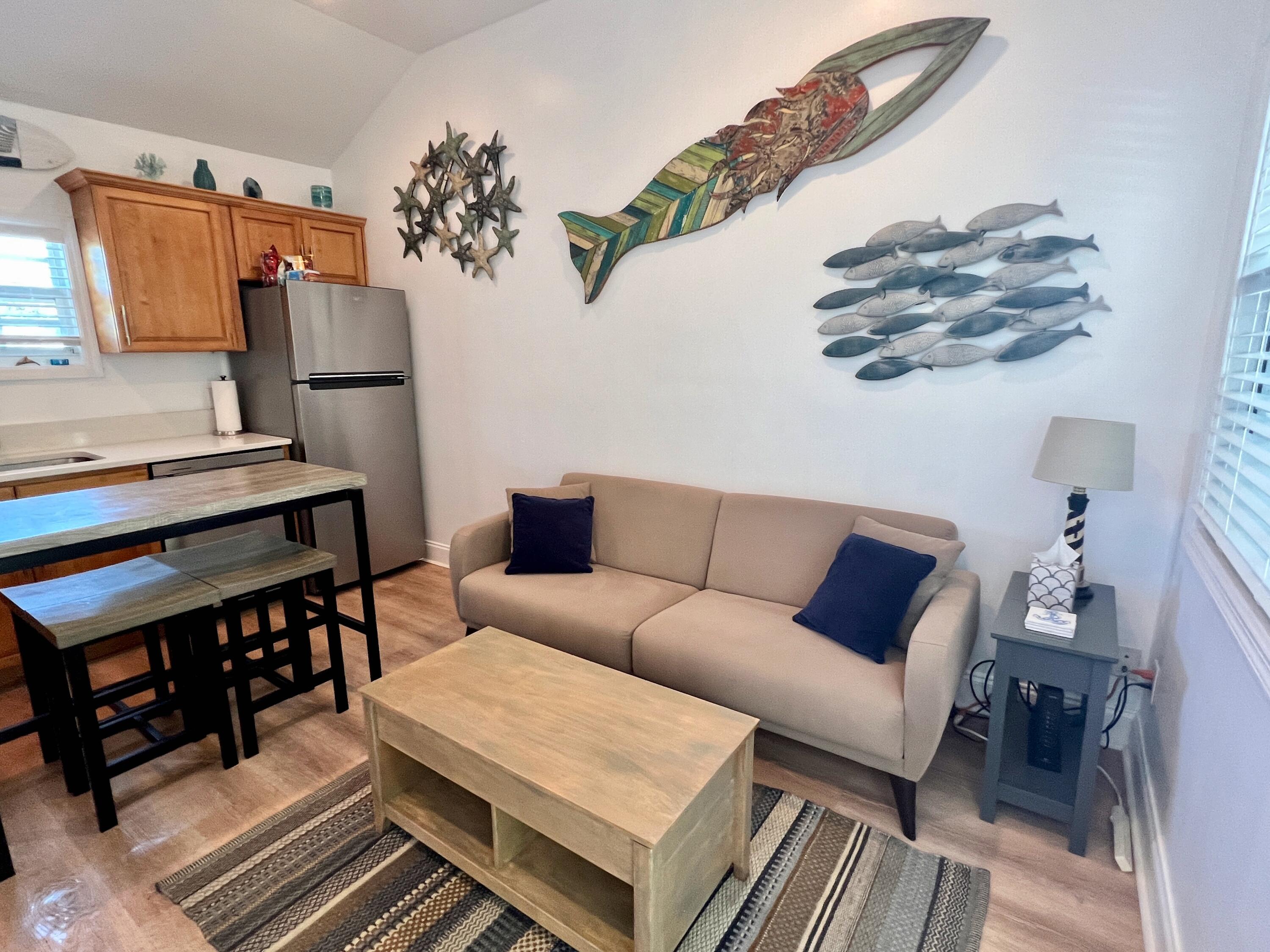 904 Terry Lane, Unit 4 Key West, FL 33040 - Photo 2 of 14 a living room with furniture and a couch