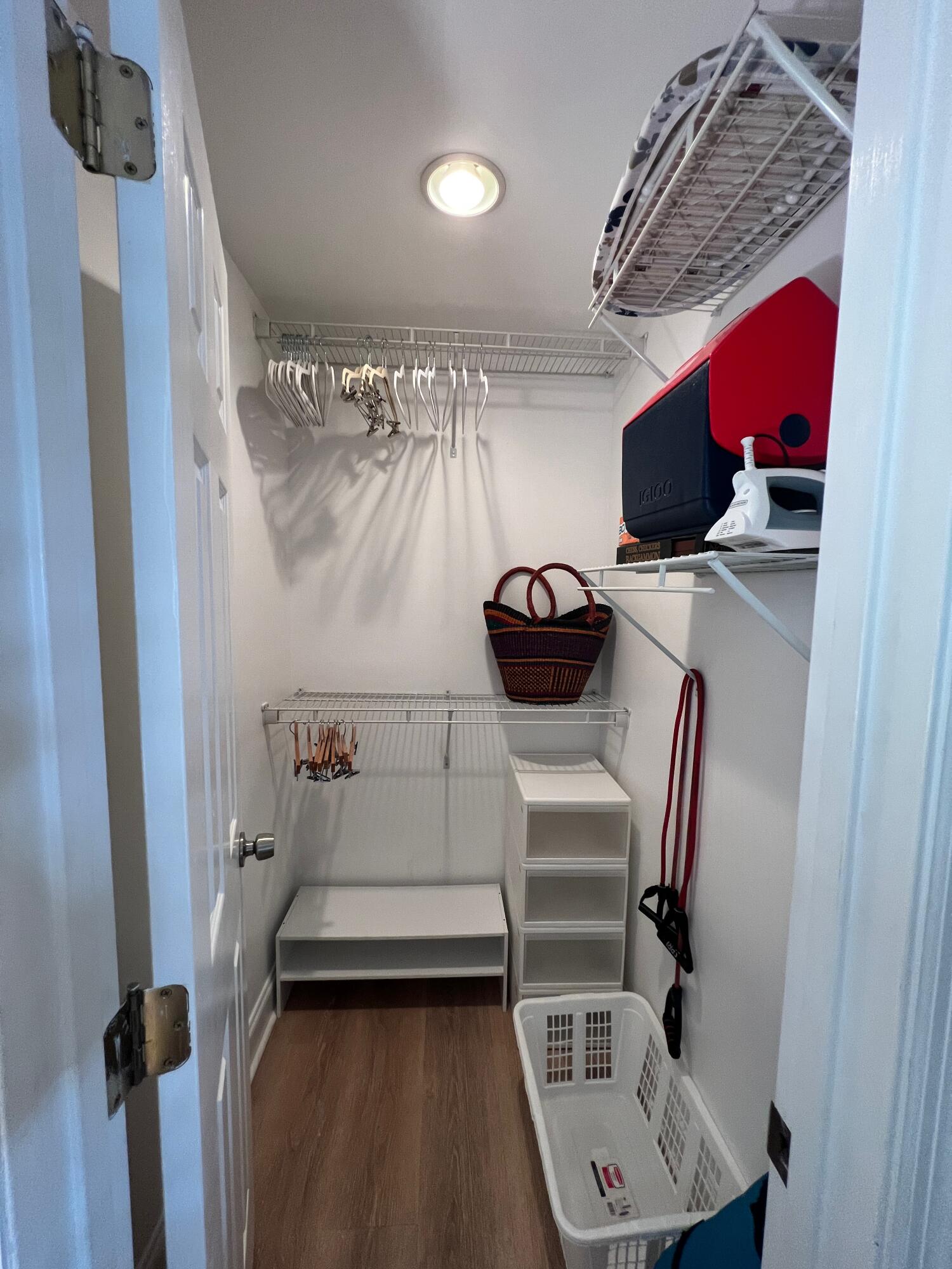 904 Terry Lane, Unit 4 Key West, FL 33040 - Photo 7 of 14 a bedroom with a bed and a chandelier