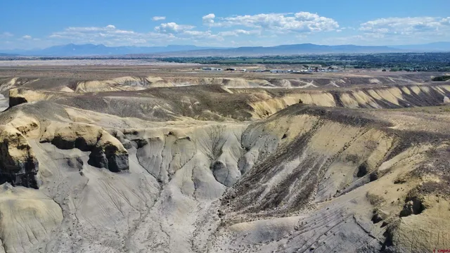 a view of a road with wooden floor