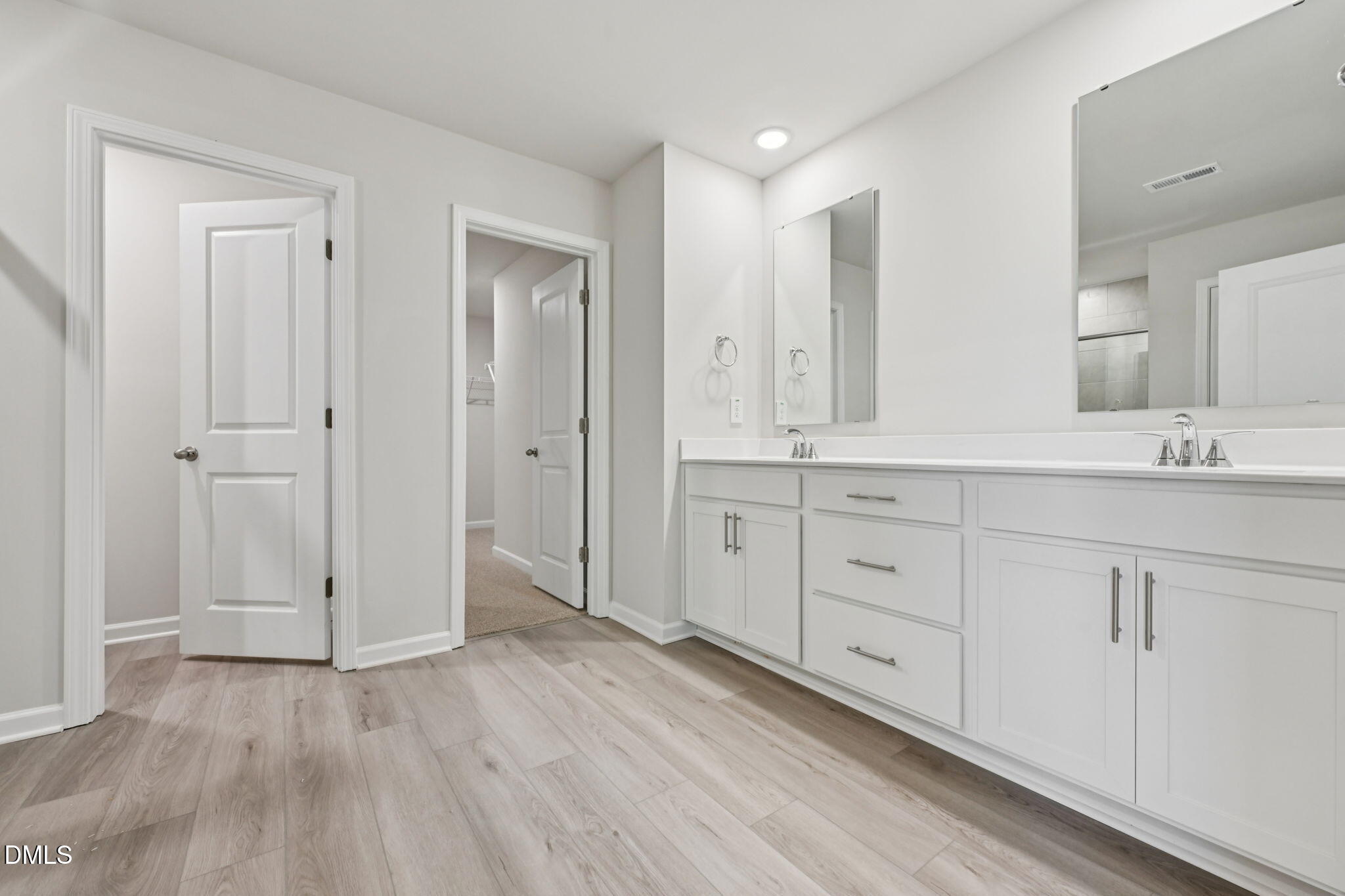 2145 Topsail Road Durham, NC 27703 - Photo 44 of 49 a bathroom with a sink and a mirror
