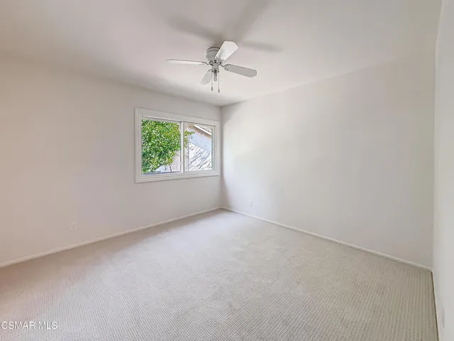 a view of garage with stairs