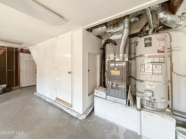 a large bathroom with a granite countertop sink mirror and shower