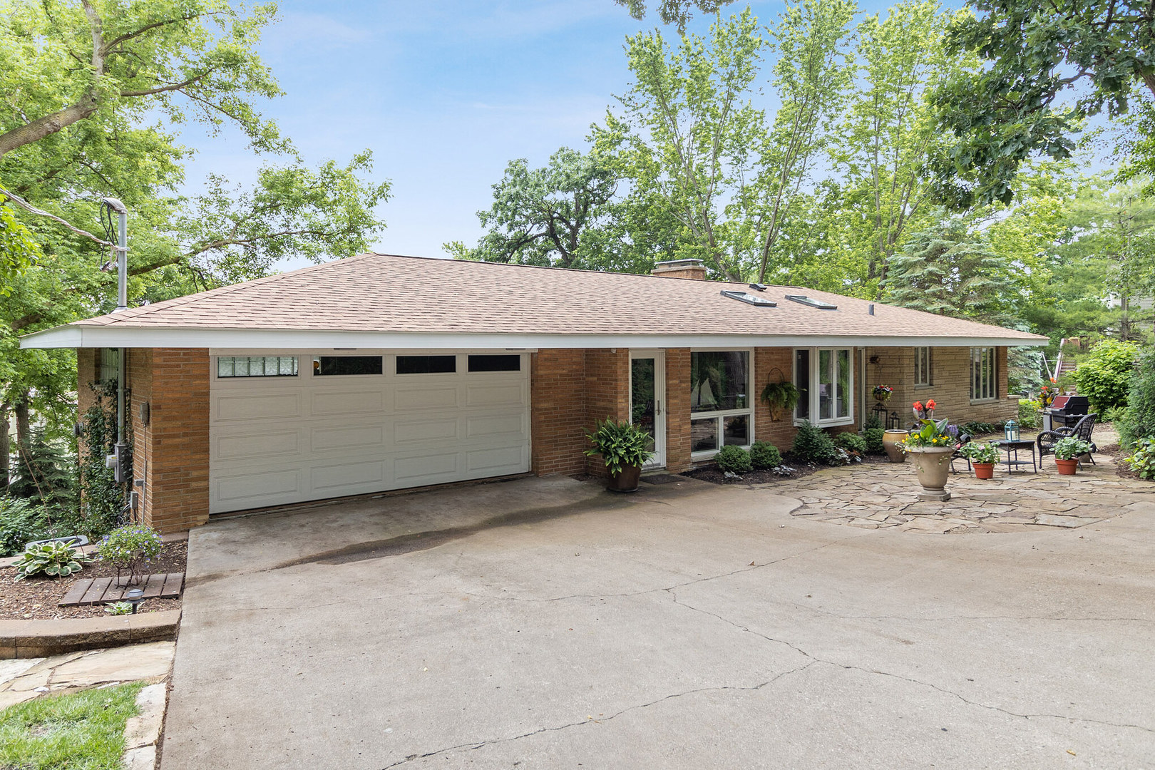 209 Mildred Avenue Cary, IL 60013 - Photo 2 of 29 a view of a house with a yard and sitting area