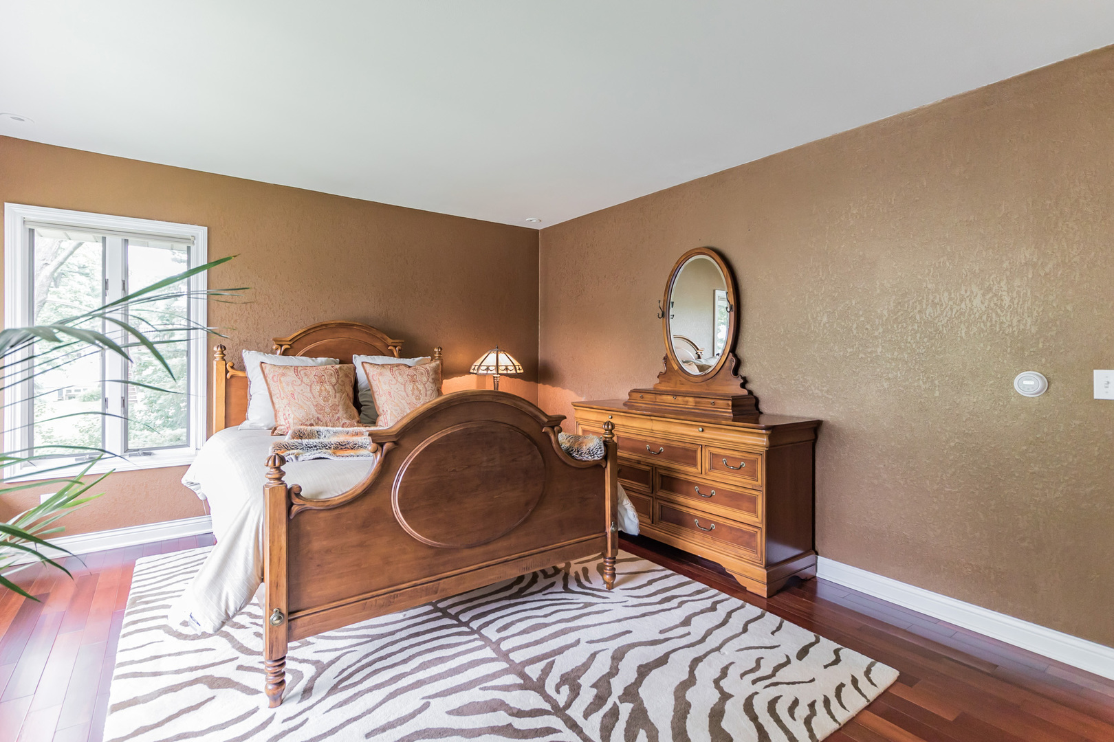 209 Mildred Avenue Cary, IL 60013 - Photo 12 of 29 a room with furniture a mirror and next to a window
