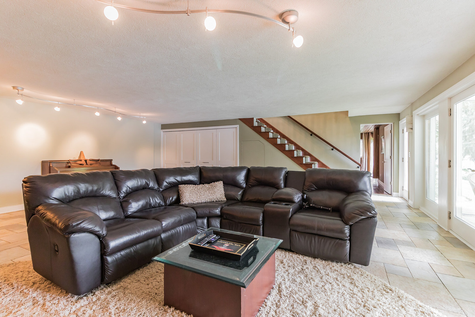 209 Mildred Avenue Cary, IL 60013 - Photo 14 of 29 a living room with furniture and a lamp