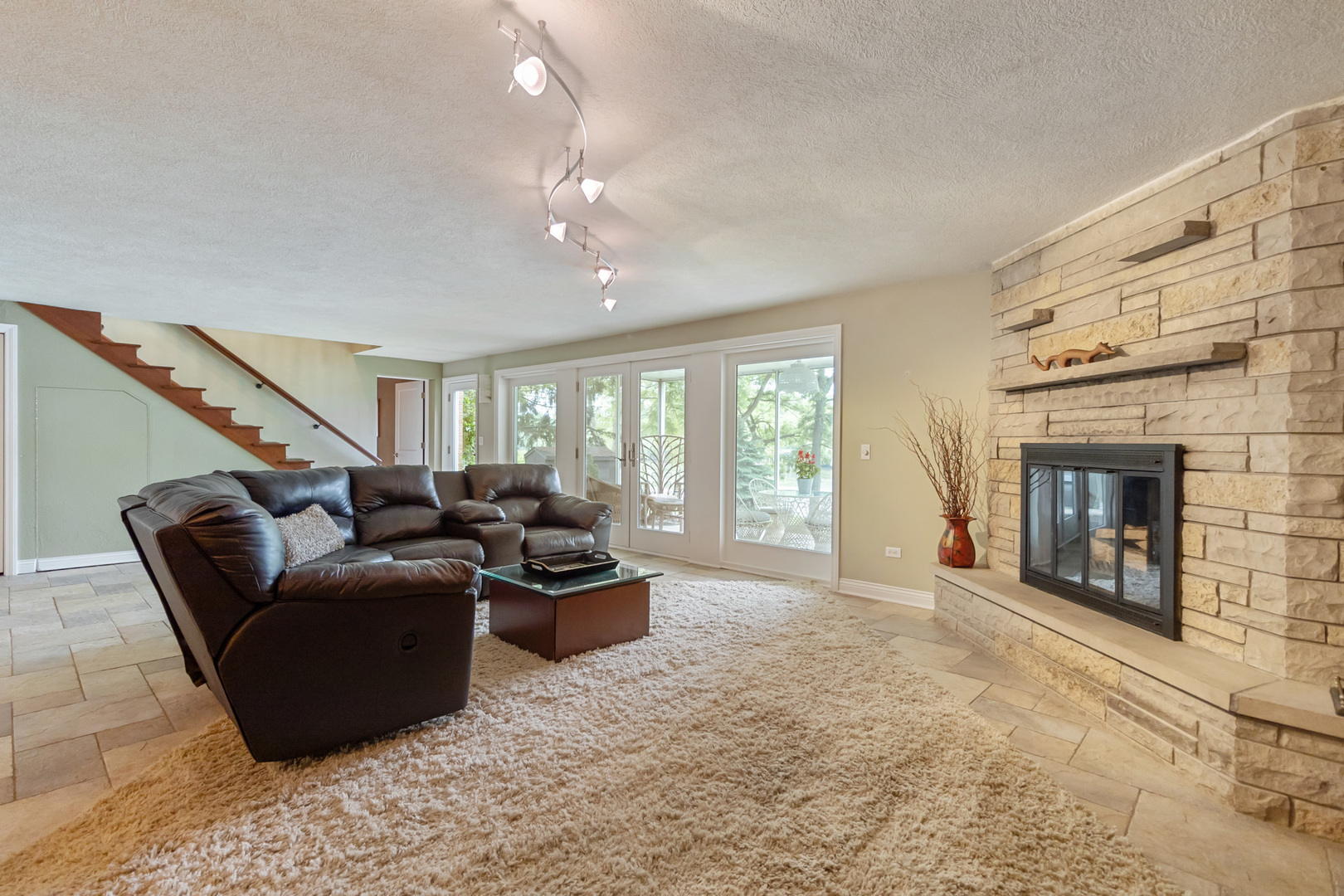 209 Mildred Avenue Cary, IL 60013 - Photo 15 of 29 a living room with furniture and a fireplace