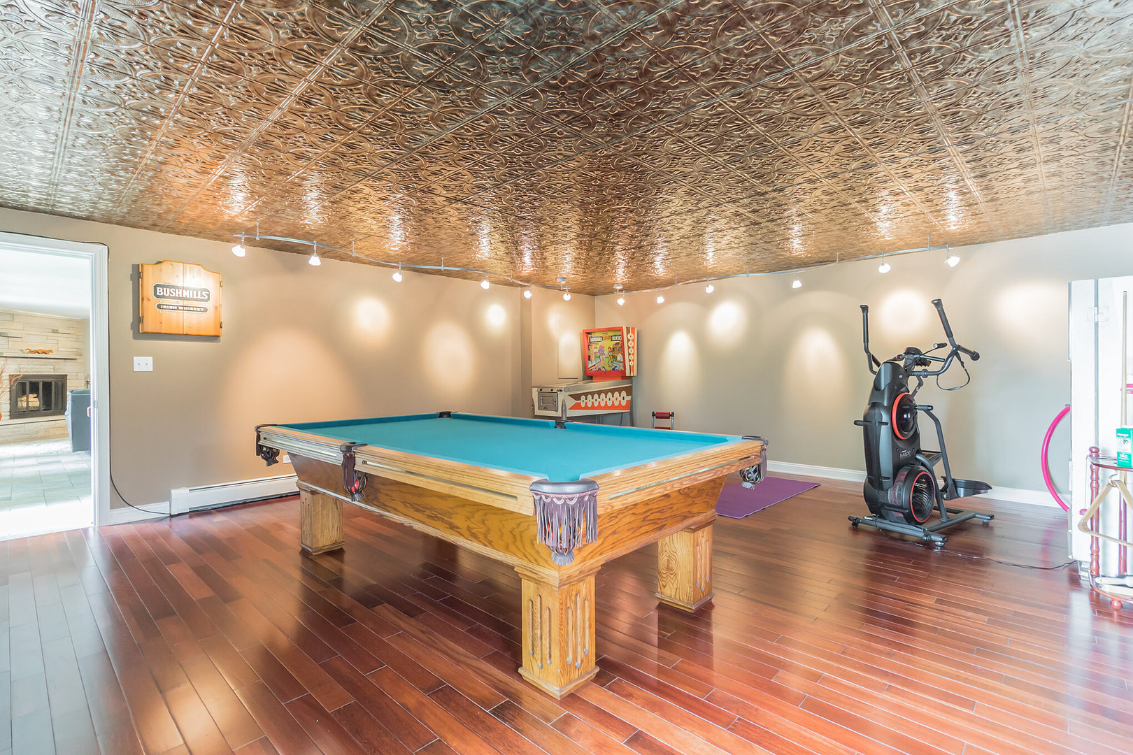 209 Mildred Avenue Cary, IL 60013 - Photo 18 of 29 a room with wooden floor and pool table