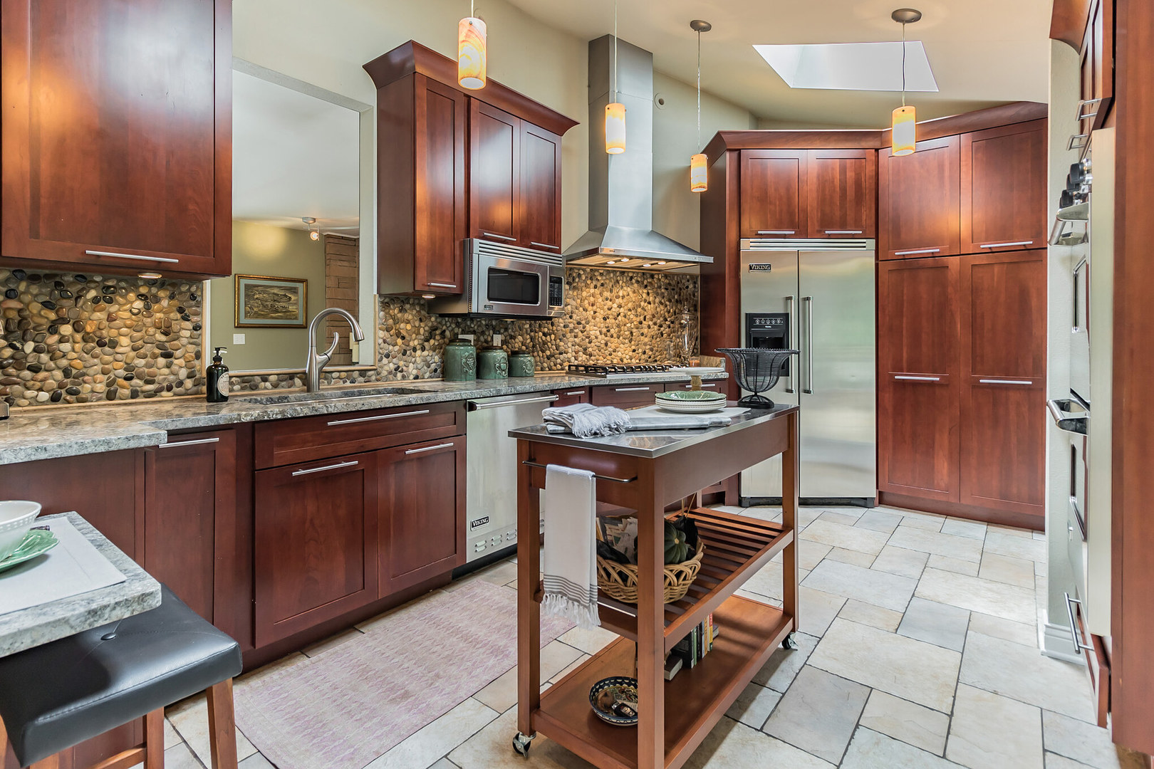209 Mildred Avenue Cary, IL 60013 - Photo 3 of 29 a kitchen with stainless steel appliances granite countertop a stove refrigerator and cabinets
