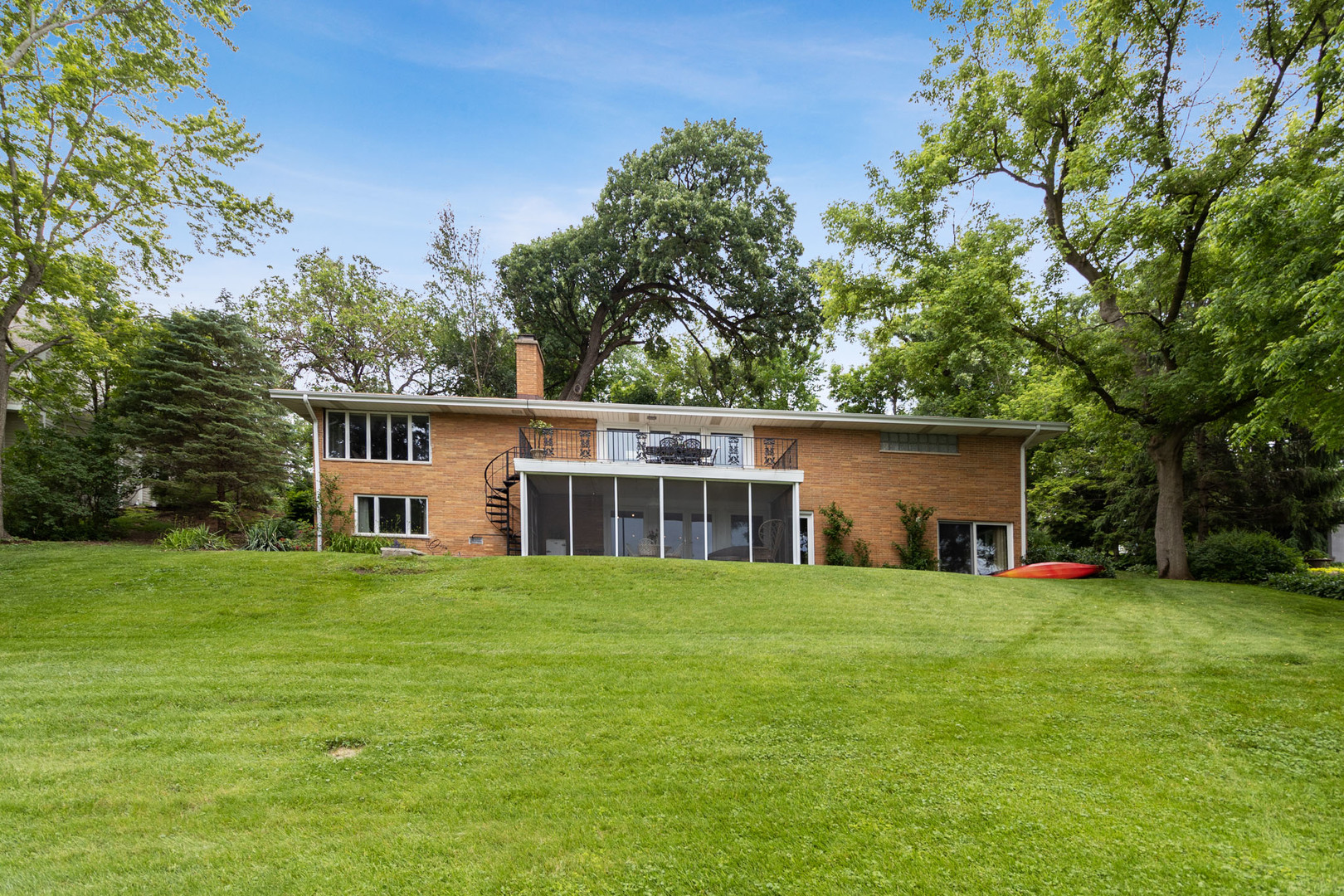 209 Mildred Avenue Cary, IL 60013 - Photo 26 of 29 a view of a house with a yard and trees