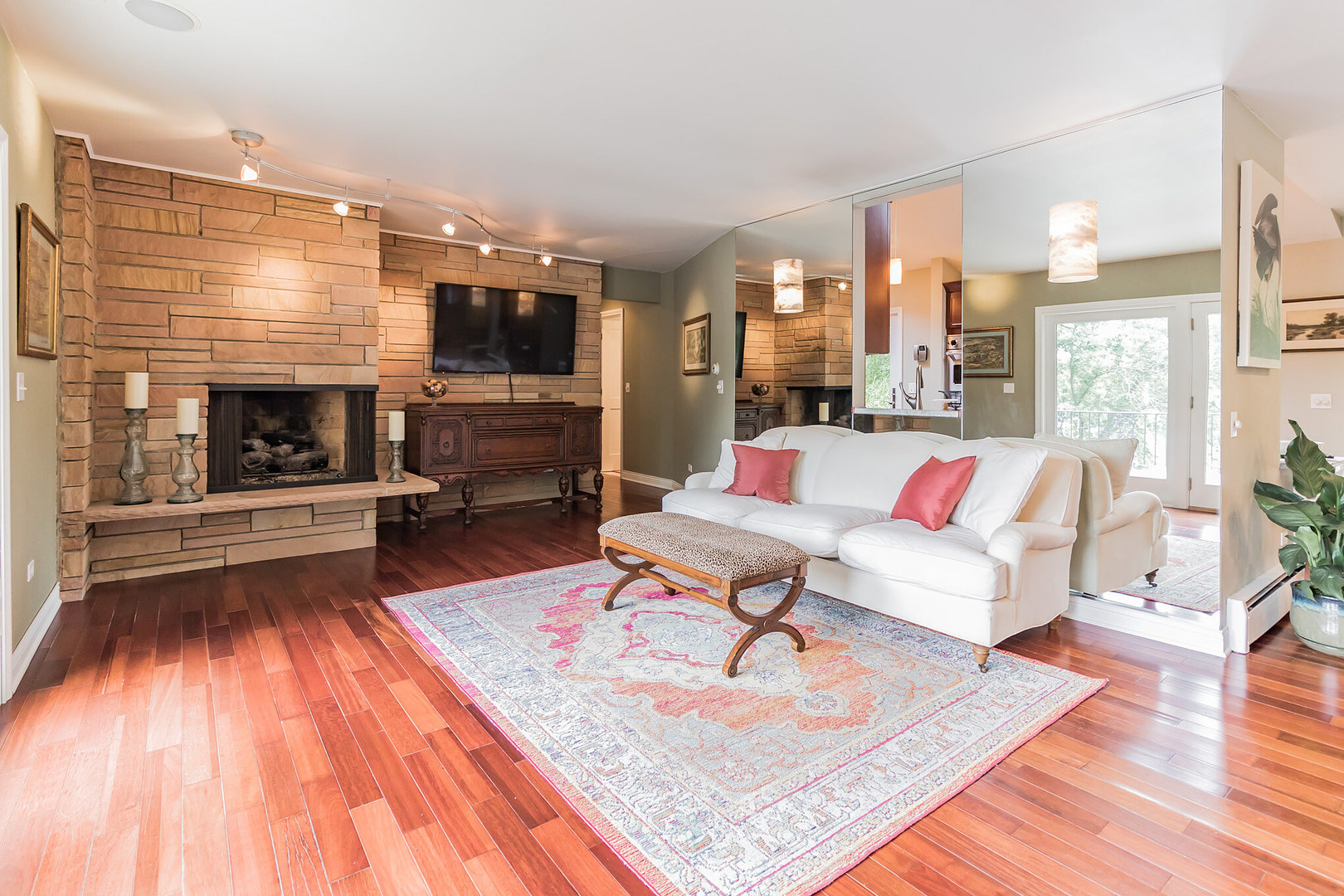 209 Mildred Avenue Cary, IL 60013 - Photo 6 of 29 a living room with furniture and a fireplace