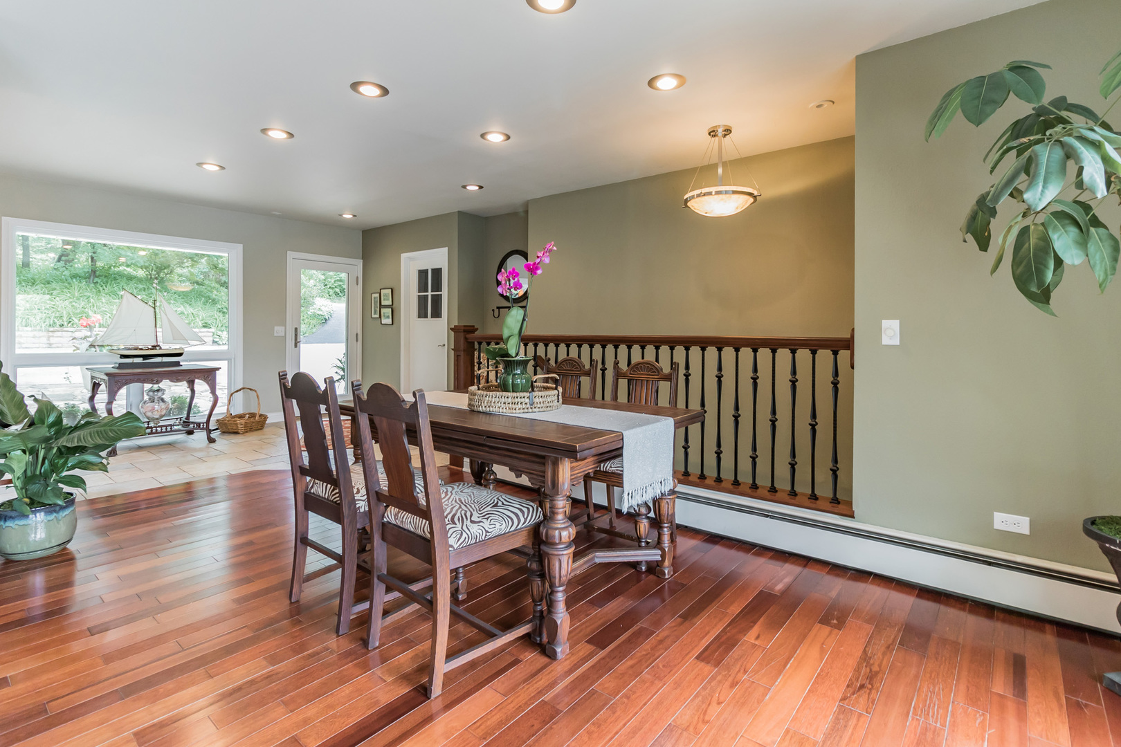 209 Mildred Avenue Cary, IL 60013 - Photo 7 of 29 a view of a dining room with furniture window and wooden floor