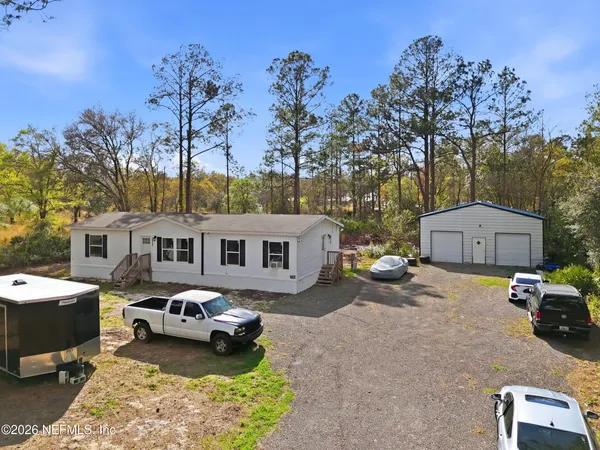 a car parked in front of a house