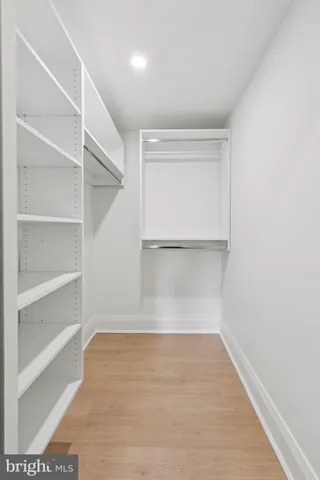 a view of an empty walk in closet