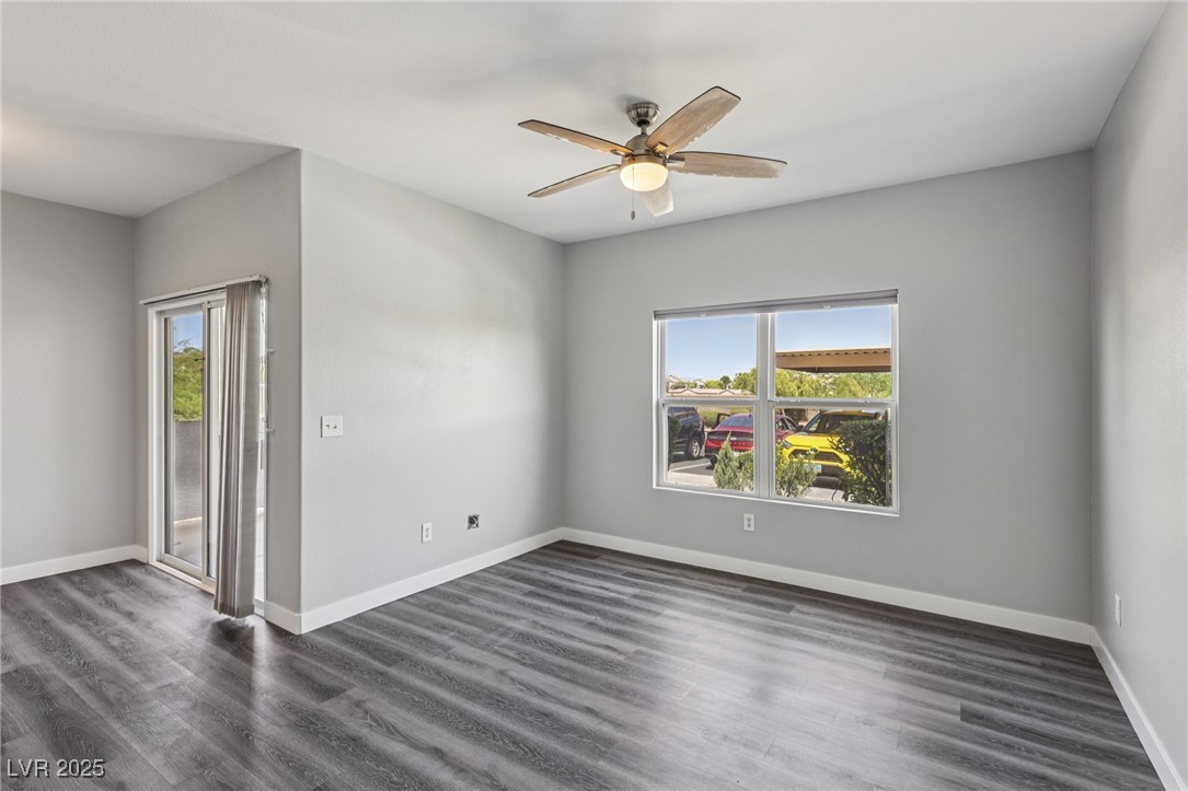 7255 West Sunset Road, Unit 1087 Las Vegas, NV 89113 - Photo 36 of 43 Unfurnished room featuring dark wood finished floors and a ceiling fan