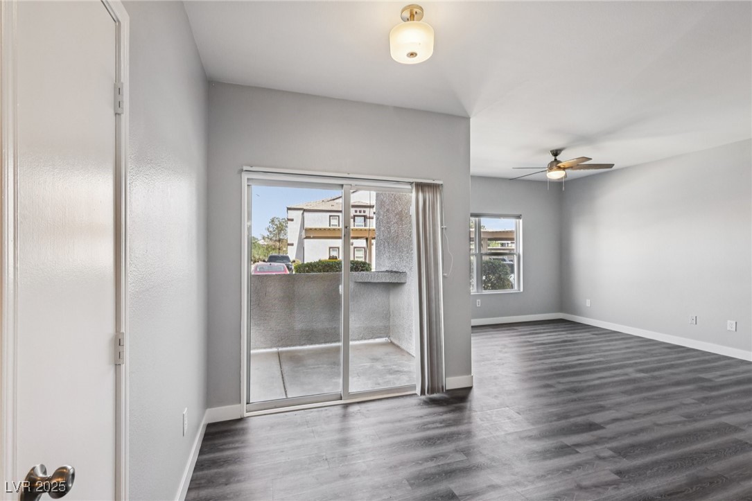 7255 West Sunset Road, Unit 1087 Las Vegas, NV 89113 - Photo 10 of 43 Unfurnished room with dark wood-style floors and ceiling fan