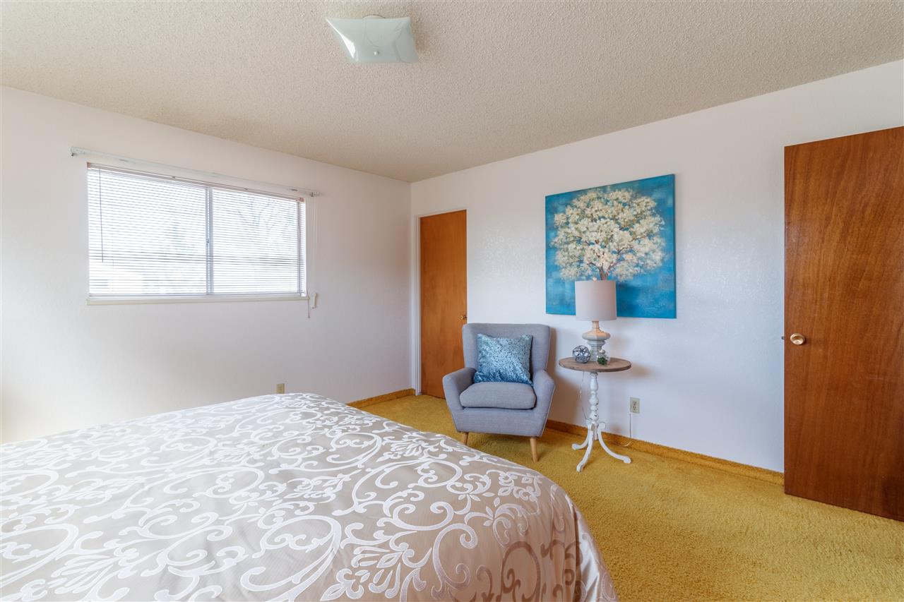 234-28 28 1/2 Road Grand Junction, CO 81503 - Photo 11 of 18 a bedroom with a bed and a couch
