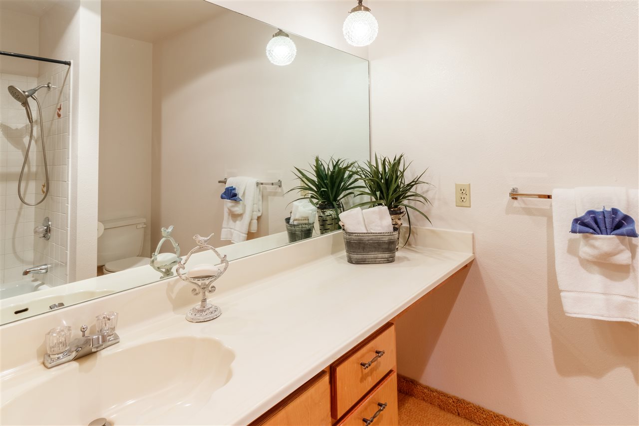 234-28 28 1/2 Road Grand Junction, CO 81503 - Photo 12 of 18 a bathroom with a sink a vanity and a mirror