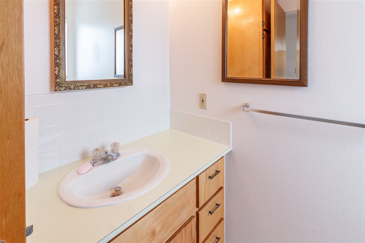 234-28 28 1/2 Road Grand Junction, CO 81503 - Photo 15 of 18 a bathroom with a sink and a mirror