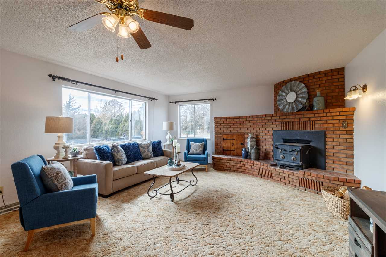 234-28 28 1/2 Road Grand Junction, CO 81503 - Photo 3 of 18 a living room with furniture and a fireplace