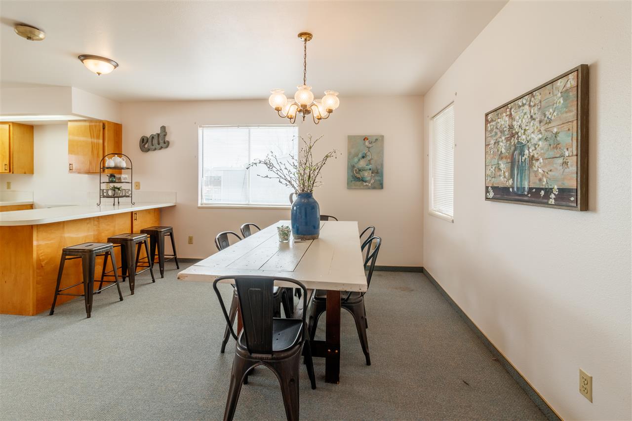 234-28 28 1/2 Road Grand Junction, CO 81503 - Photo 7 of 18 a dining room with furniture and window