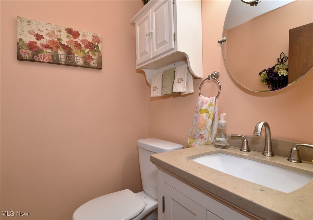 5510 Som Center Road Solon, OH 44139 - Photo 29 of 38 Half bath on the first floor featuring toilet and vanity