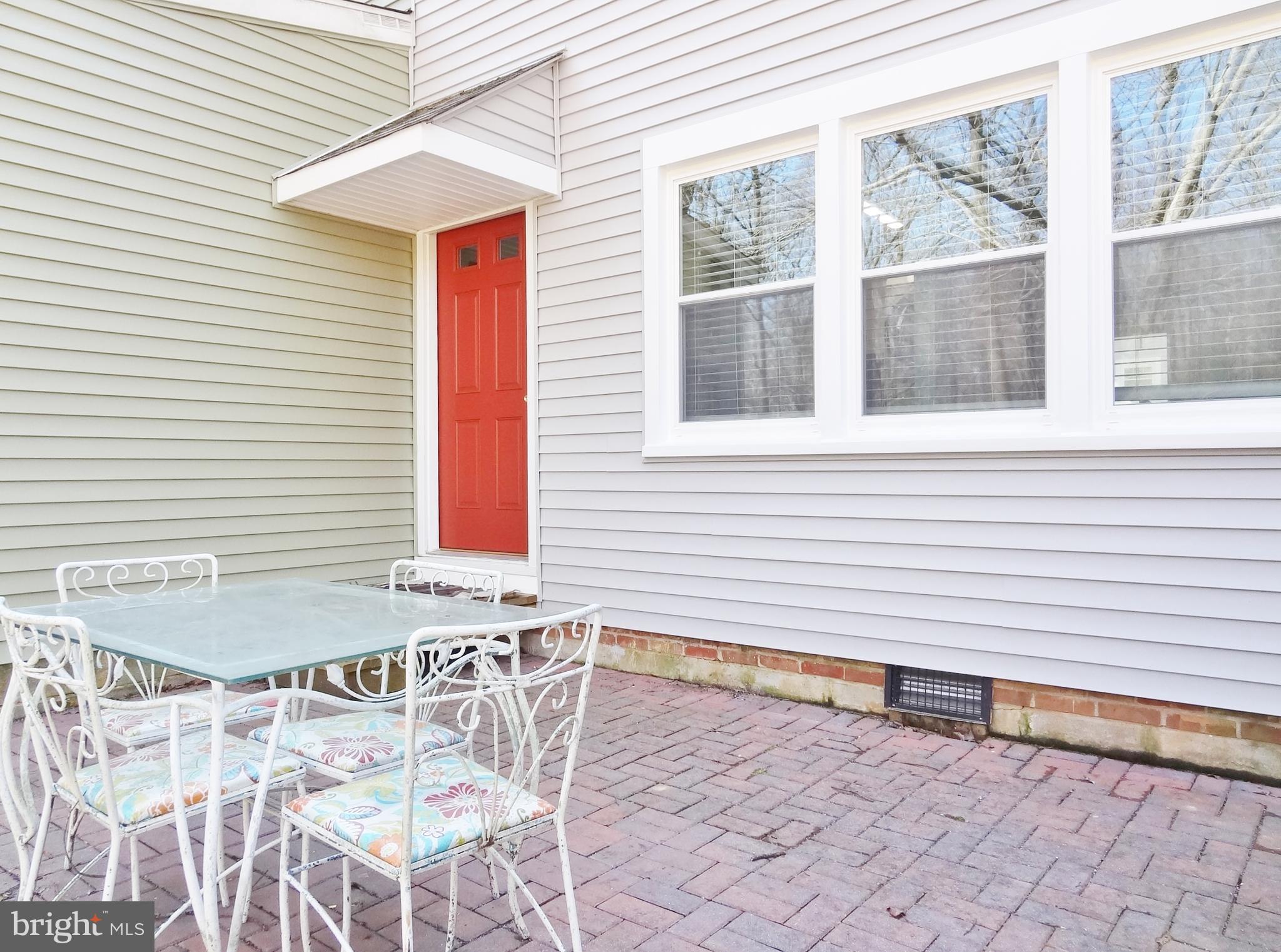 38 Ridge Road, Unit C Greenbelt, MD 20770 - Photo 15 of 16 Brick patio in backyard