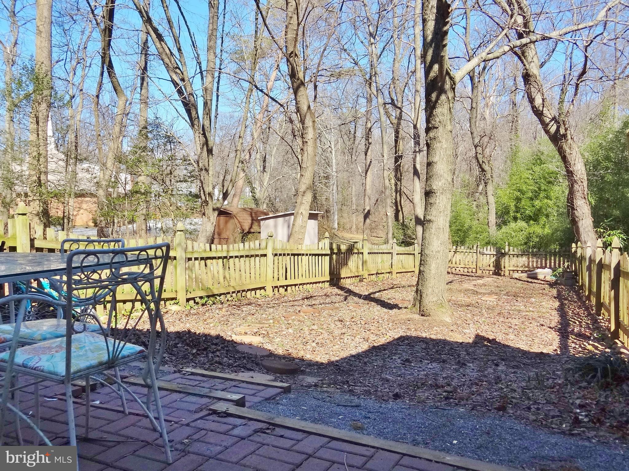 38 Ridge Road, Unit C Greenbelt, MD 20770 - Photo 10 of 16 Fenced backyard with patio