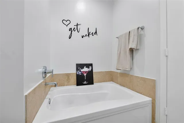 a bathroom with a bathtub