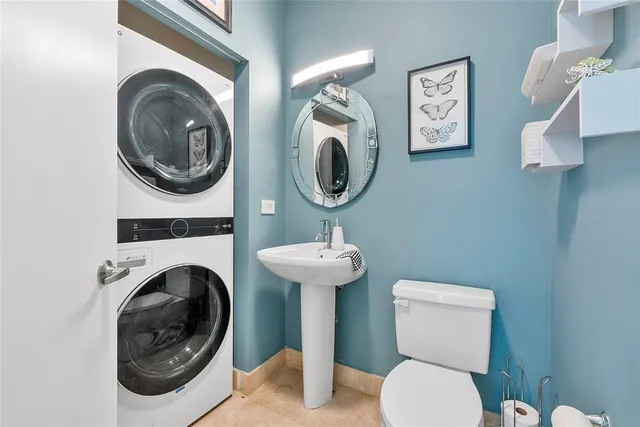 a bathroom with a toilet and a sink