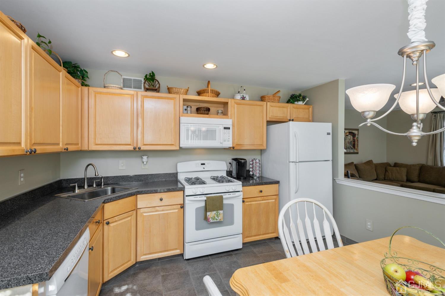 508 Grandview Street Middlesex, NJ 08846 - Photo 2 of 20 a kitchen that has a sink a stove and a refrigerator