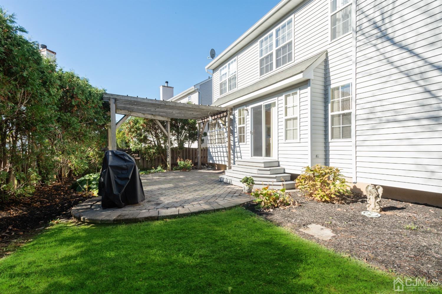 508 Grandview Street Middlesex, NJ 08846 - Photo 20 of 20 a view of a house with backyard and sitting area