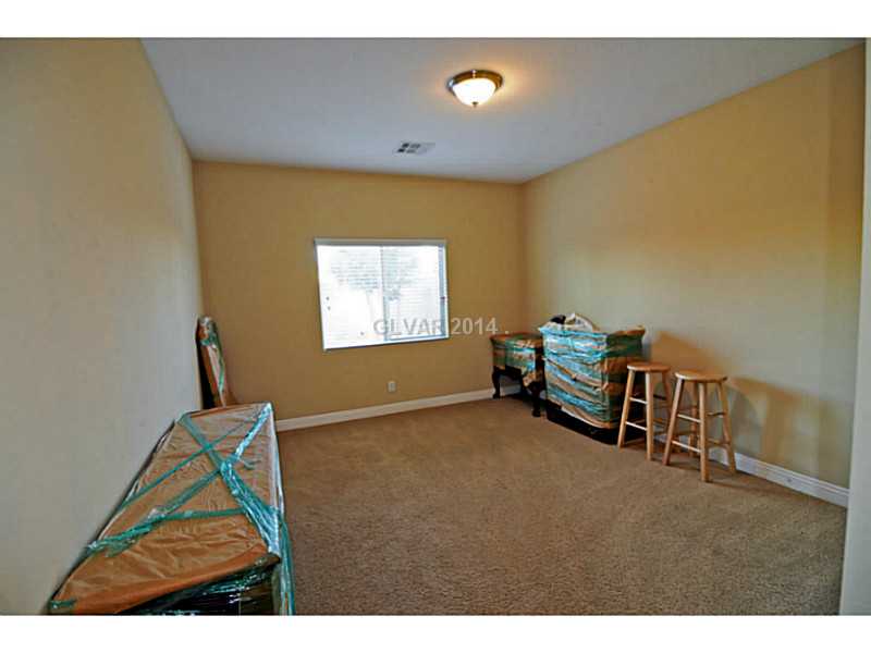 4638 Eel Point Street Las Vegas, NV 89147 - Photo 11 of 30 Bedroom. Secondary Bedroom 1 downstairs