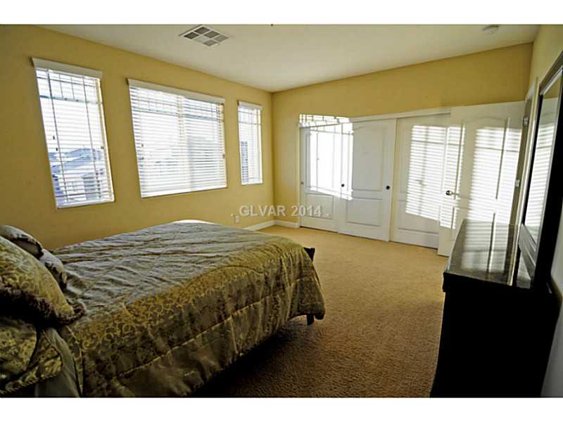 4638 Eel Point Street Las Vegas, NV 89147 - Photo 16 of 30 Bedroom. Secondary Bedroom 2 upstairs
