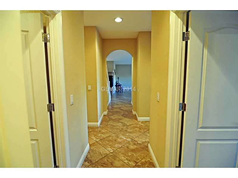 4638 Eel Point Street Las Vegas, NV 89147 - Photo 10 of 30 Other. Hall to downstairs bedroom and laundry room