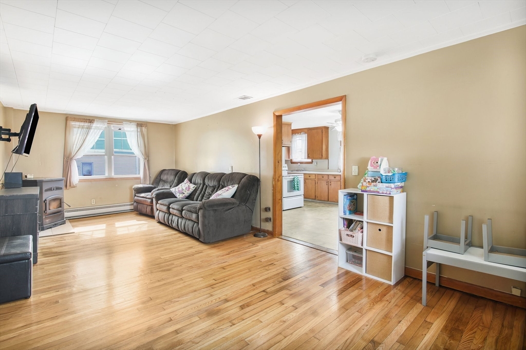 25 North Street Three Rivers, MA 01080 - Photo 8 of 33 a living room with furniture and a wooden floor