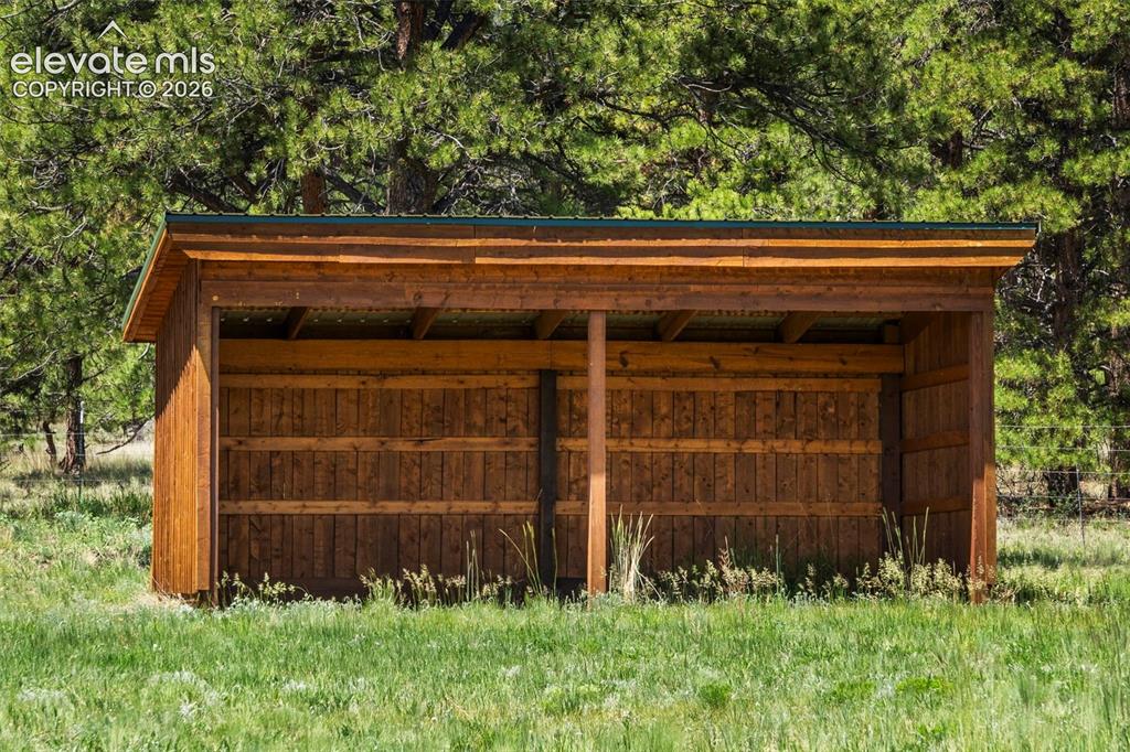 546 Pulver Road Lake George, CO 80827 - Photo 35 of 45 a view of house with backyard and garden