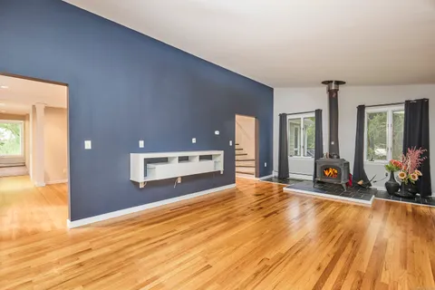 a view of a living room and bathroom