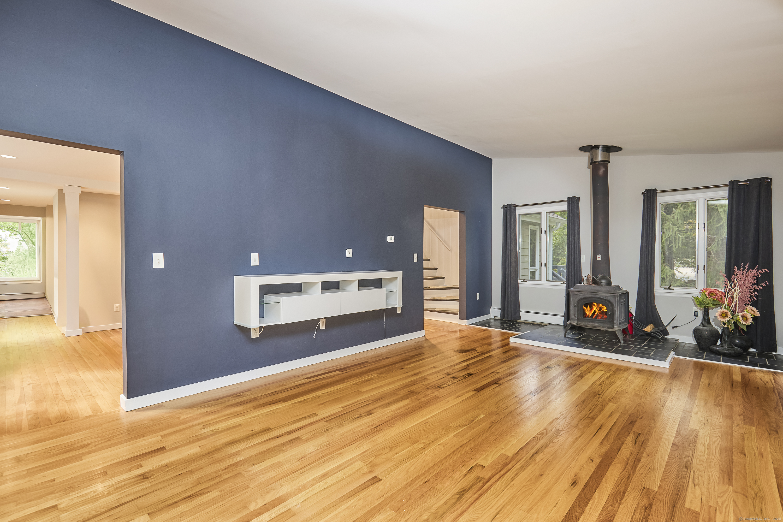 4 Colony Road Weston, CT 06883 - Photo 17 of 39 a view of a living room and bathroom