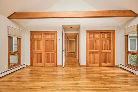 a view of empty room with windows