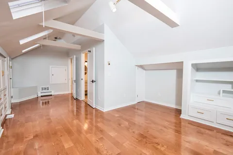 a view of a livingroom with a furniture and a ceiling fan