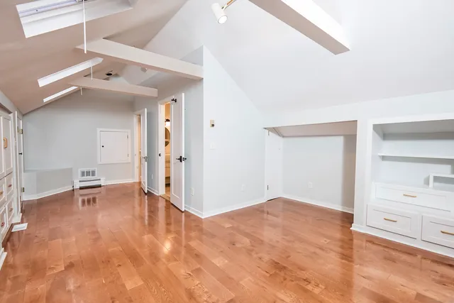 a view of a livingroom with a furniture and a ceiling fan