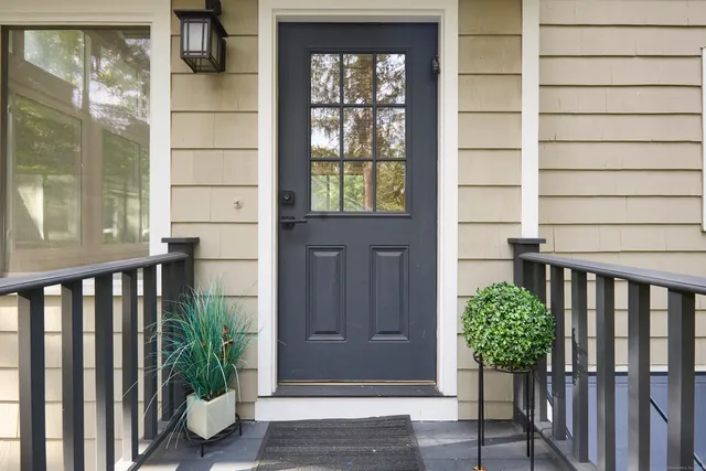 a view of front door and porch of the house
